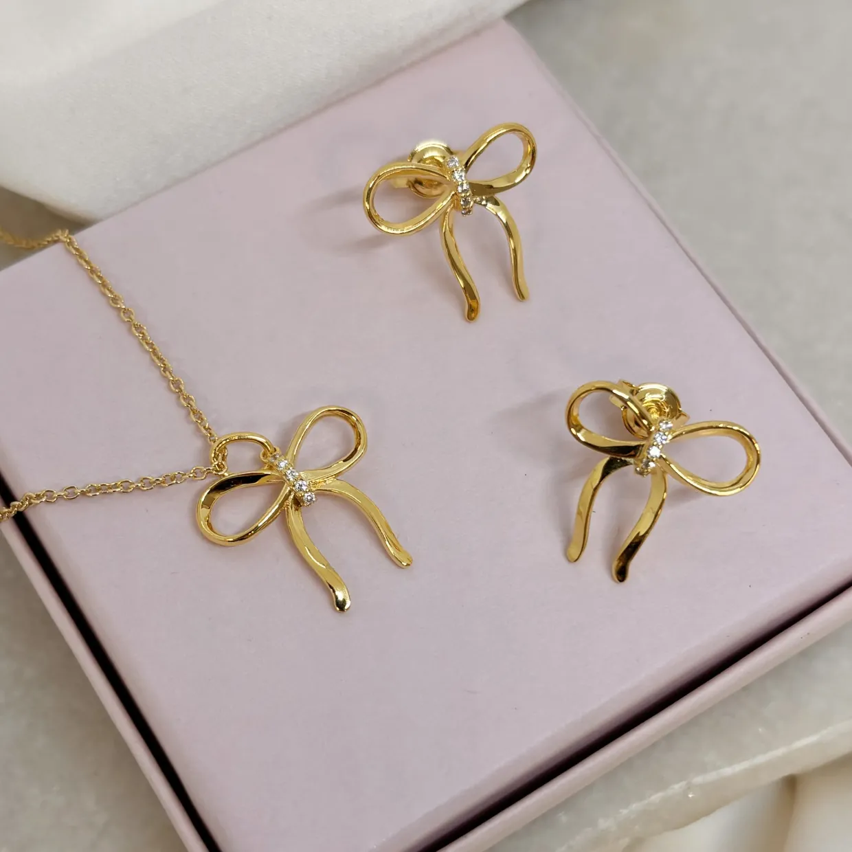 SCROUPLES SLØJFE ØRERINGE I FORGYLDT SØLV MED ZIRKONIA - 166122