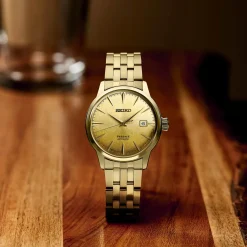 SEIKO PRESAGE MED GULD FARVET LÆNKE - SRPK46